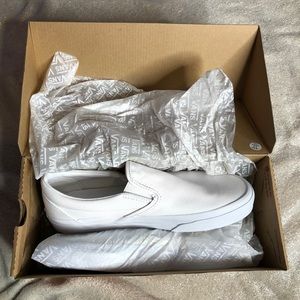 White classic slip on Vans